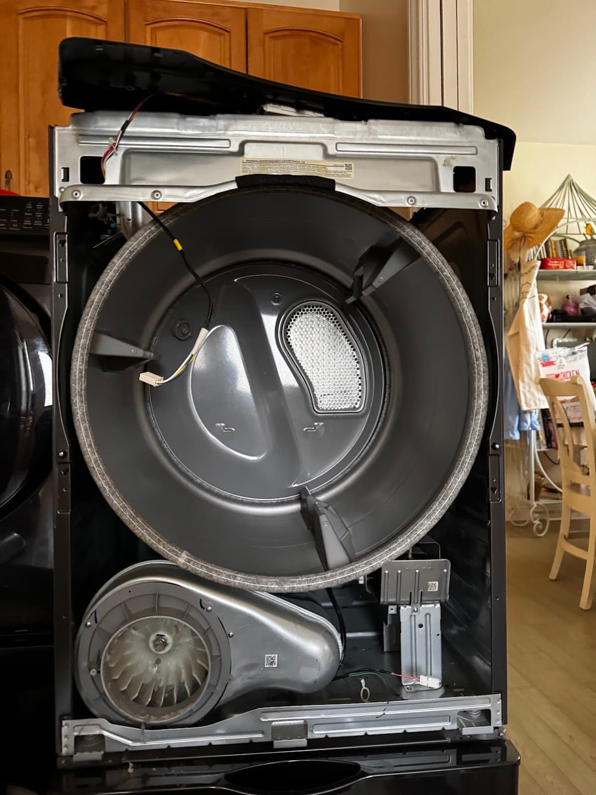 Samsung dryer fully disassembled showing drum and blower